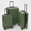 Calpak Green Ribbed Hardcase Suitcases
