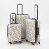 DKNY White & Brown Upright Hardshell Suitcases